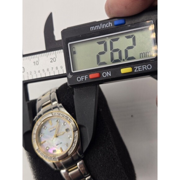 Citizen Eco-Drive Ladies' Two-Tone MOP Dial Diamonds. EW1824-57D. 6" Band. - Picture 9 of 13